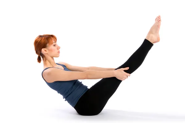 Mulher jovem magro fazendo Yoga Exercício — Fotografia de Stock