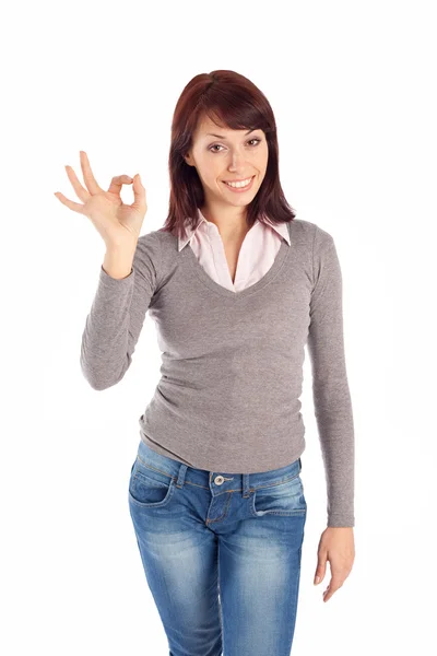 Ung kvinna visar ok gest — Stockfoto