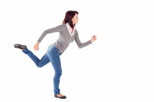 Женщина в бегущей позе — стоковое фото