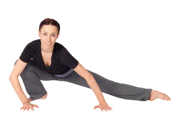 Mulher fazendo exercício de alongamento — Fotografia de Stock