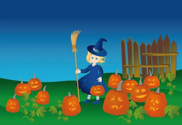 Маленькая ведьма с тыквенным фонариком на Хэллоуин — стоковое фото