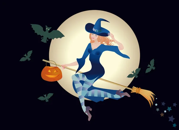 Merry young witch with a pumpkin — Stock Photo, Image