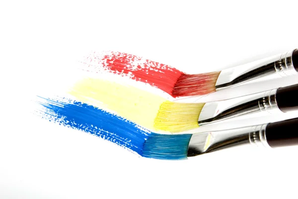 Pincel pintando una raya de arco iris — Foto de Stock
