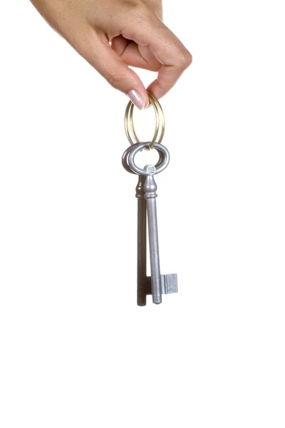 Stock image Hand holding keys