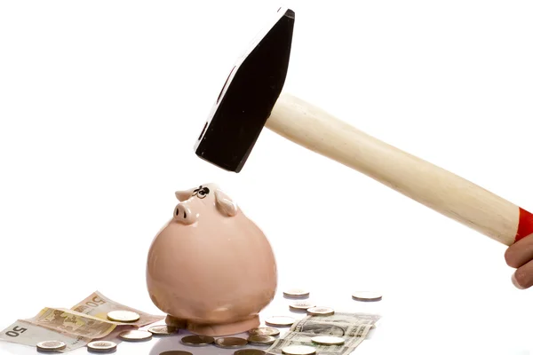 Breaking a piggy bank — Stock Photo, Image