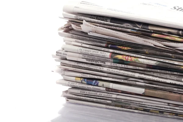 Old newspapers and magazines on a pile — Stock Photo, Image