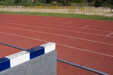3000 metres hurdle on the tracks clipart