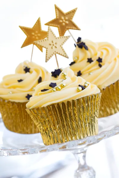 Golden cupcakes — Stock Photo, Image