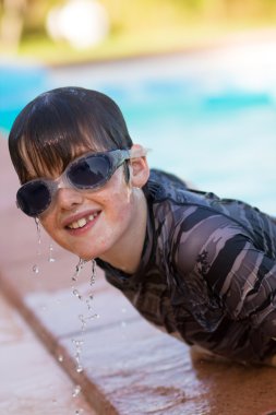 Boy with swimming goggles clipart