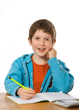 Boy doing homework clipart