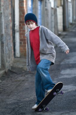 Boy skateboarding clipart