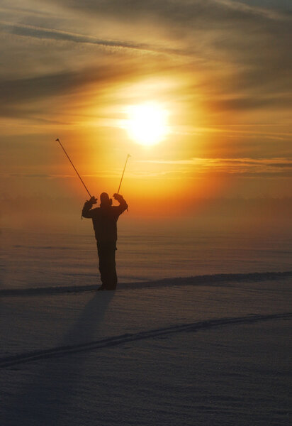 Skier on sunset
