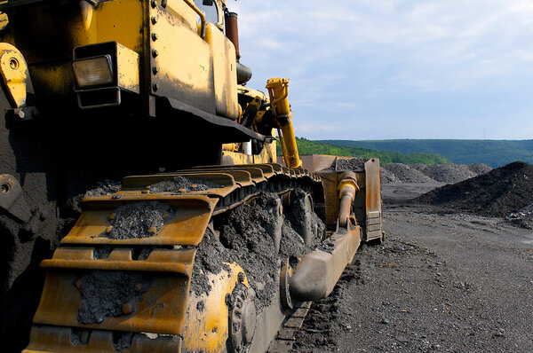 Bull dozer at a coal mine.