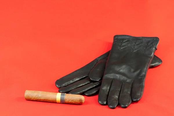 Gloves and cigar — Stock Photo, Image