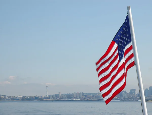 stock image American flag over Seattle