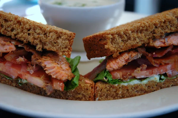 stock image Salmon sandwich close-up, shallow DOF