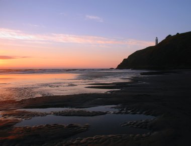 North Head Lighthouse at sunset clipart