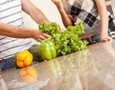 Young Couple with Vegetables clipart