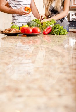 Young Couple with Vegetables clipart