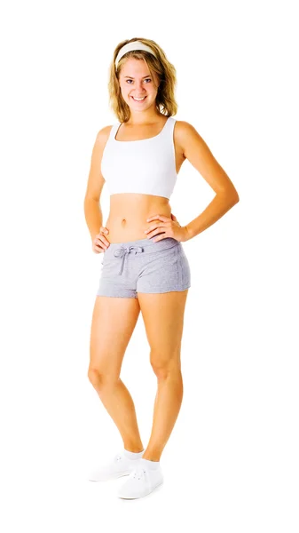 Mujer joven haciendo ejercicio en blanco — Foto de Stock