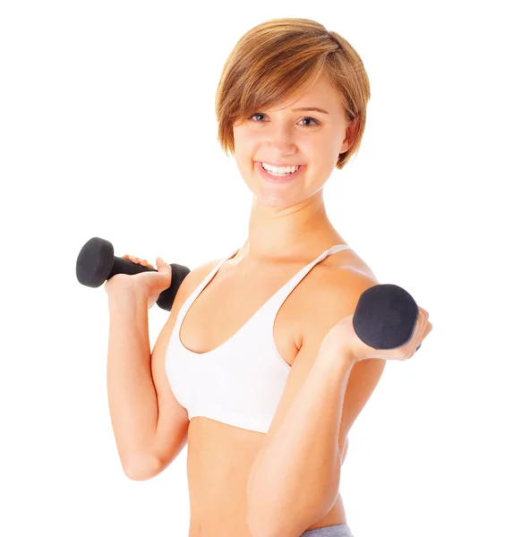 Ung kvinna lyfta vikter — Stockfoto