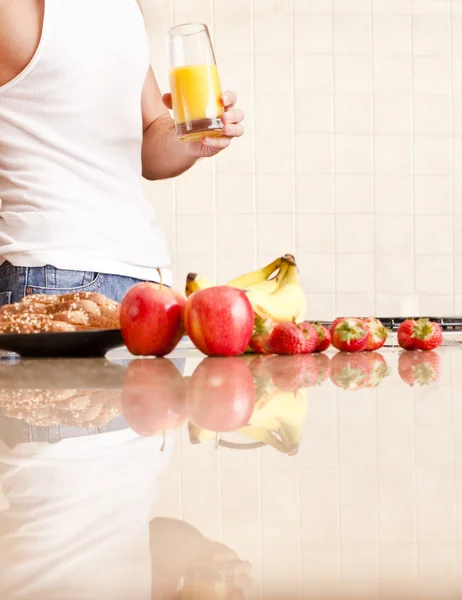 stock image Young Man Holding Glass of Orange Juice