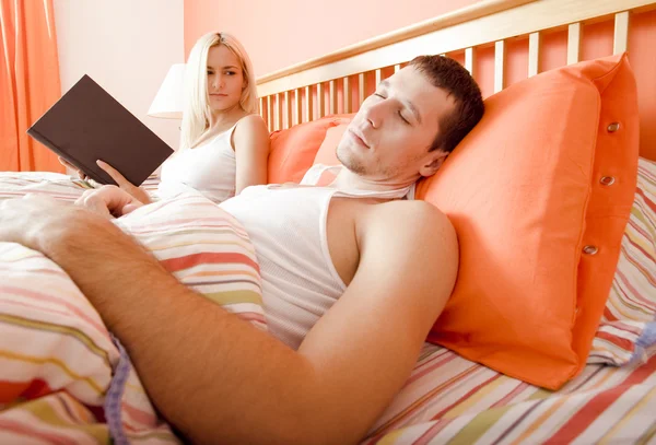 Couple Relaxing in Bed — Stock Photo, Image