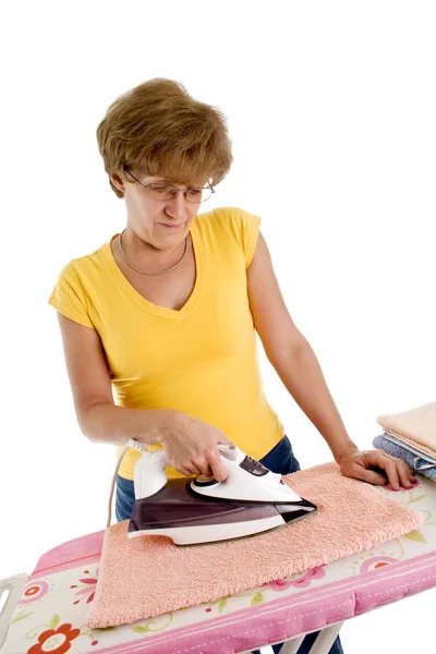 stock image Woman tired of doing the ironing