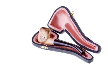 Handmade pipe in a case clipart