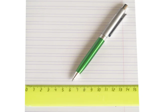 Livro de escrita, caneta e régua — Fotografia de Stock