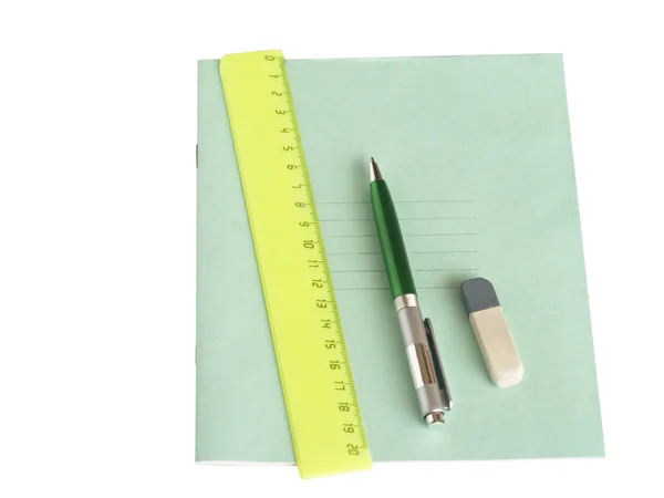 Livro de escrita, régua, caneta e proibição elástica — Fotografia de Stock