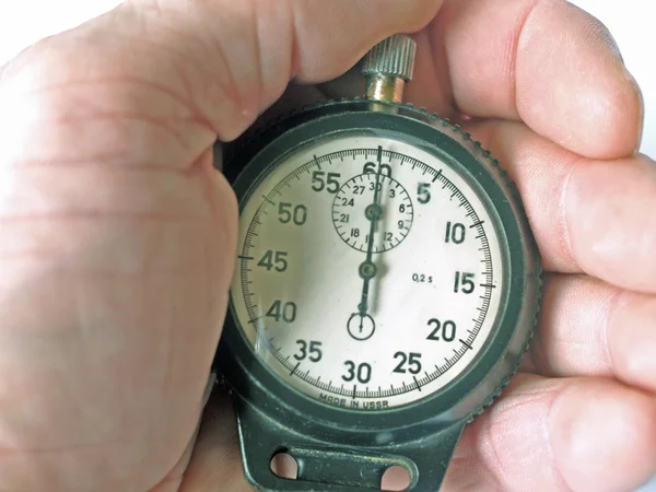 Retro a stop watch in a hand — Stock Photo, Image