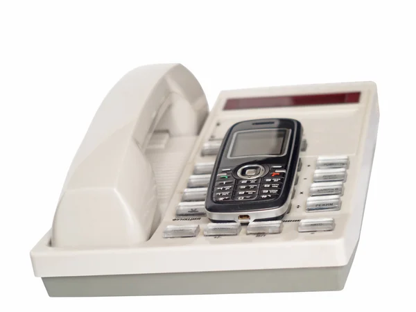 Teléfonos de oficina y móviles — Foto de Stock