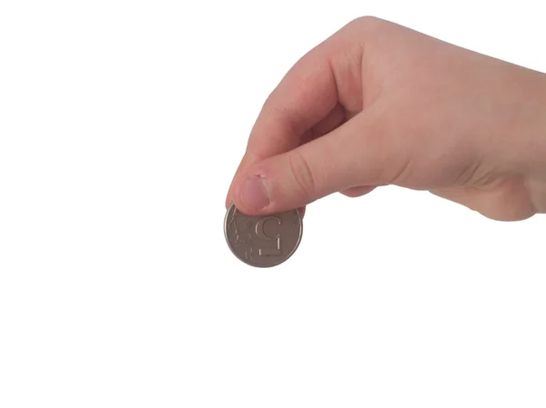 Palce dłoni trzyma monetę — Zdjęcie stockowe