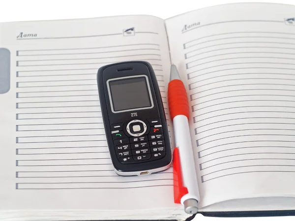 Organizzatore, telefono cellulare e penna — Foto Stock