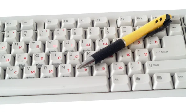 Klavye ve kalem — Stok fotoğraf
