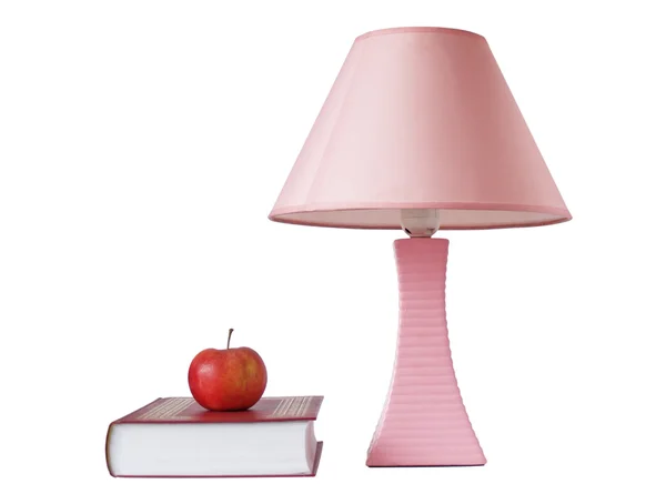 Lampy biurko, książki i jabłko — Zdjęcie stockowe