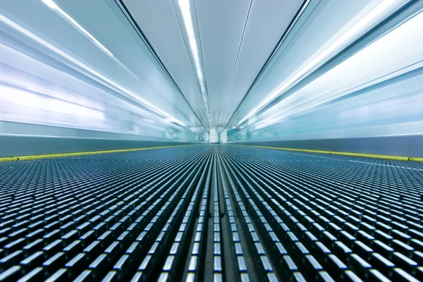 Movement on an airport escalator Stock Picture