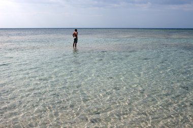 Single person in the ocean clipart