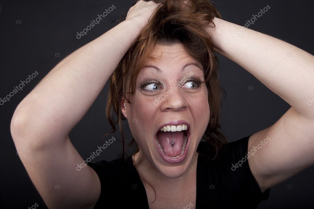 Portrait of a young crazy woman — Stock Photo © cozmopics 2101885