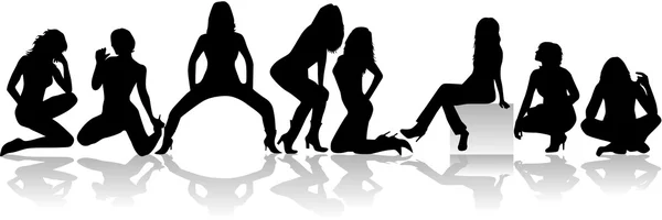 Sexy girls group vector silhouettes — Stock Vector