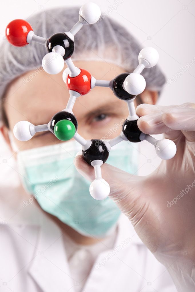 Scientist with atom