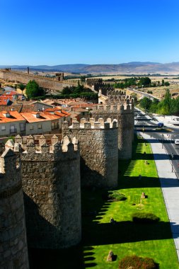 The famous city walls in Avila clipart