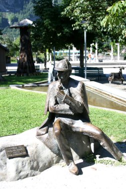 Statue of Holmes on Meiringen clipart