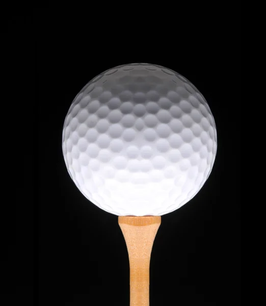 Golfboll på svart — Stockfoto