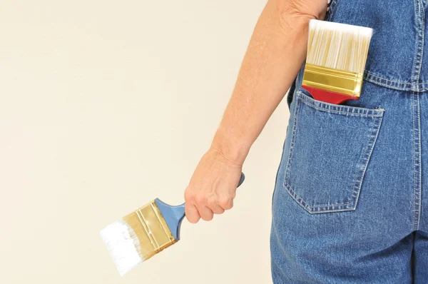 Woman in Overalls with Paint Brushes — Stock Photo, Image