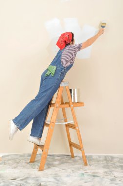 Woman on Ladder Painting clipart
