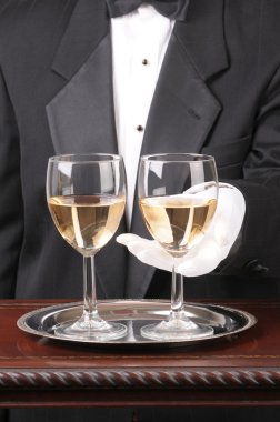 Waiter With Two Glasses of Chardonnay clipart