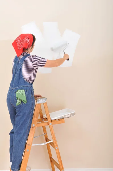 Woman on Ladder Painting Wall — Stock Photo, Image