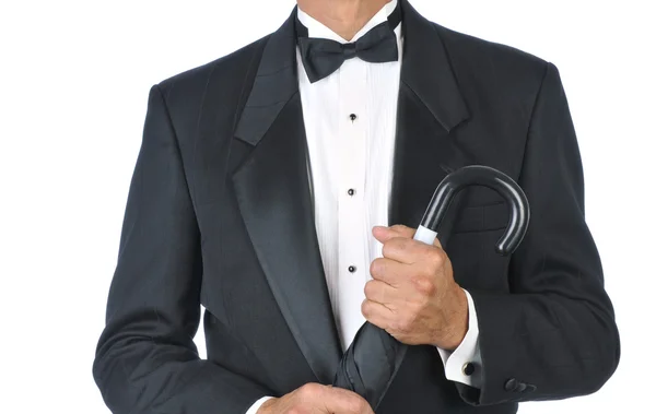 Man dragen tuxedo bedrijf paraplu — Stockfoto